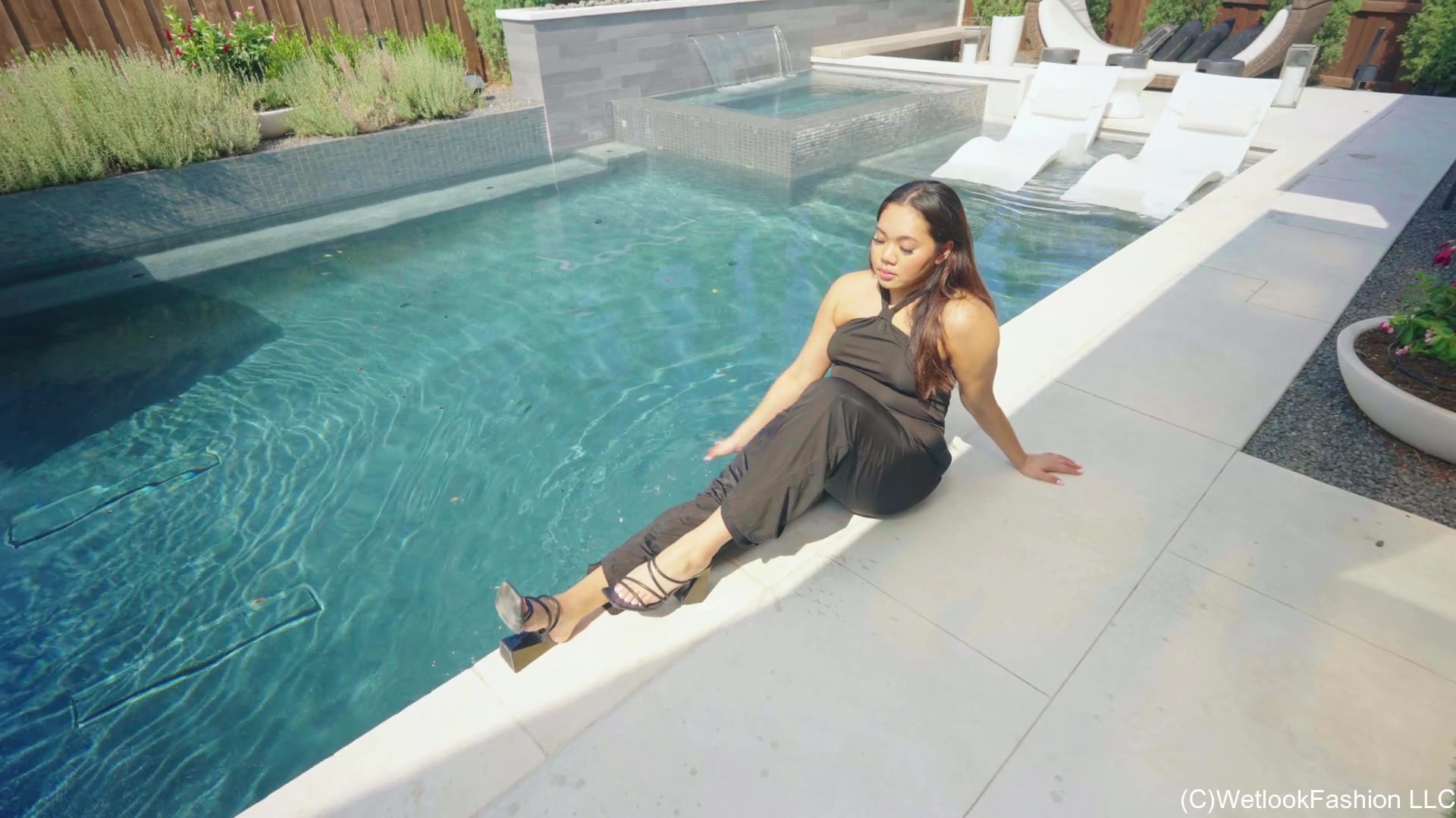 Tina Takes a Dip in the Pool Wearing a Shiny Jumpsuit