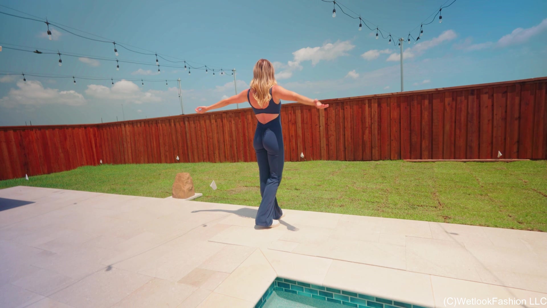 Victoria's Wet Premiere Wearing a Sexy Jumpsuit and Sneakers