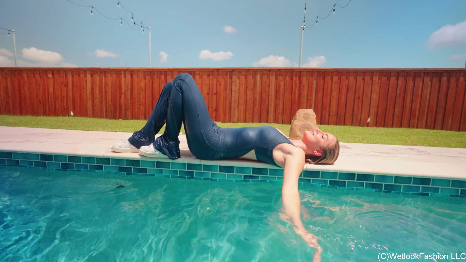 Victoria's Wet Premiere Wearing a Sexy Jumpsuit and Sneakers