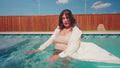 Yesenia Gets Wet in a Dress and a Trench Coat