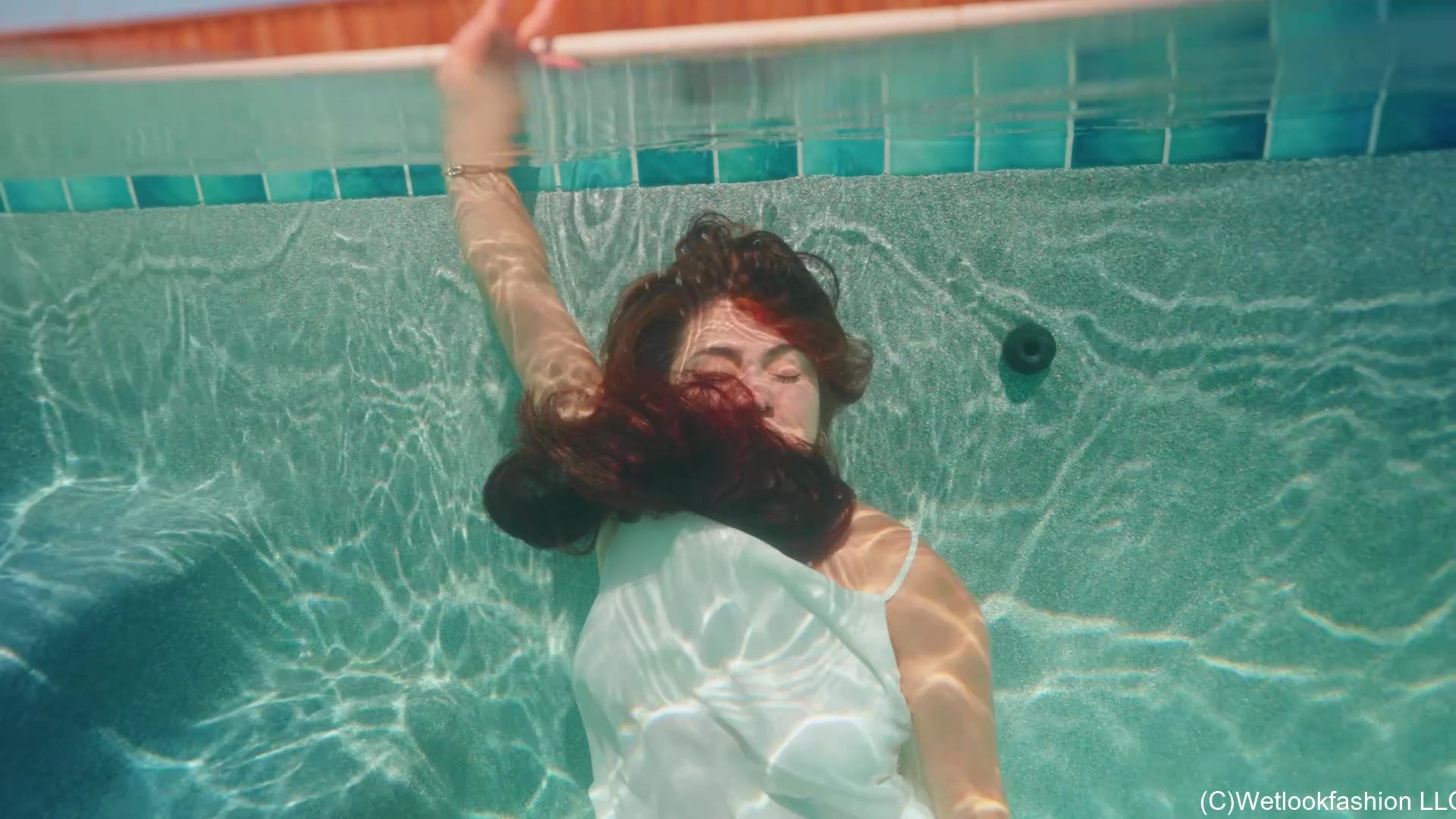 Yesenia Takes a Dip in White Satin